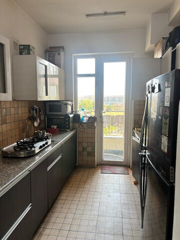 Kitchen in 3 BHK Apartment at Supertech Araville, Sector 79 – for Rent