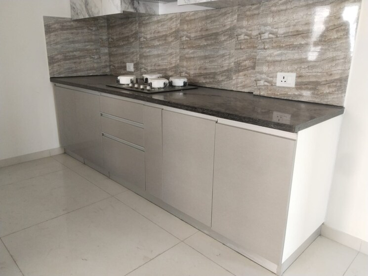 Kitchen, shapoorji-pallonji-joyville-phase-2 3 Bedroom 1852 Sq.Ft. Apartment In Sector 102 Gurgaon 8769087