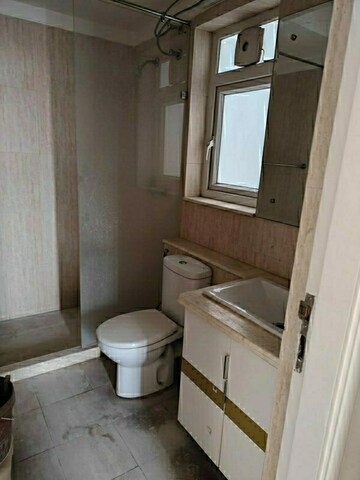Bathroom in 3 BHK Apartment at DLF The Skycourt, Sector 86 – for Rent