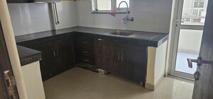 Kitchen in 3 BHK Apartment at Adani M2K Oyster Grande, Sector 102 – for Sale