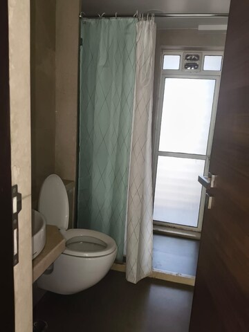 Bathroom in 2 BHK Apartment at Paradigm Nivan, Khar West – for Sale