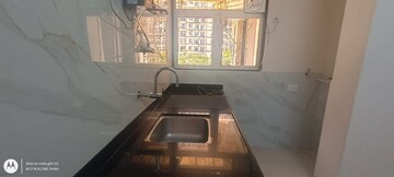 Kitchen in 4 BHK Apartment at Acme Ozone, Manpada – for Rent
