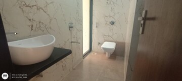 Bathroom in 4 BHK Apartment at Acme Ozone, Manpada – for Rent