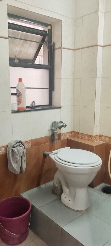 Bathroom in 2 BHK Apartment at Vasant Oscar, Mulund West – for Rent