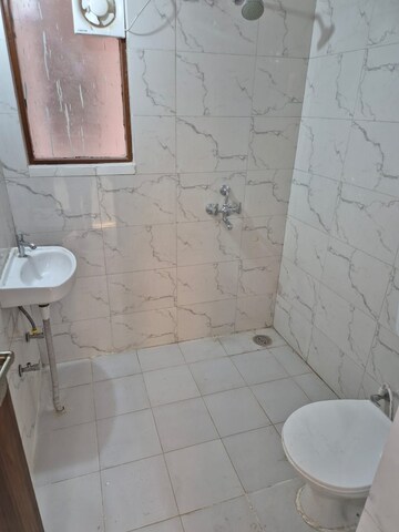 Bathroom in 3 BHK Apartment at Adore Samriddhi, Sector 89 – for Rent
