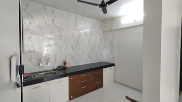 Kitchen in 2 BHK Apartment at Nest Saswad Aashirwad Homes, Ravet – for Rent