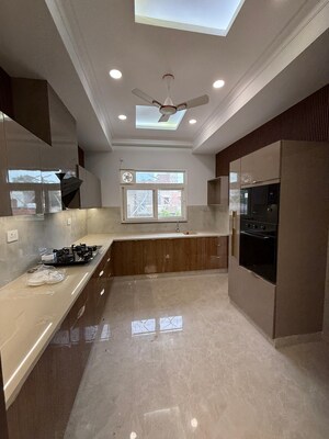 Kitchen in 4 BHK Builder Floor at Srishti Greenfield Homes, Green Fields Colony – for Sale