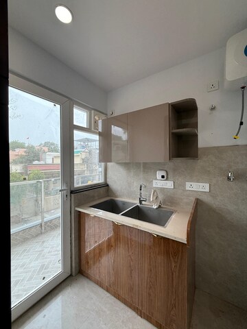 Kitchen in 4 BHK Builder Floor at Srishti Greenfield Homes, Green Fields Colony – for Sale