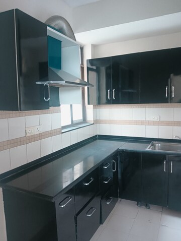 Kitchen in 3 BHK Apartment at Unitech Uniworld Gardens 2, Sector 47 – for Rent