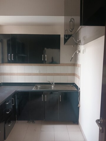 Kitchen in 3 BHK Apartment at Unitech Uniworld Gardens 2, Sector 47 – for Rent