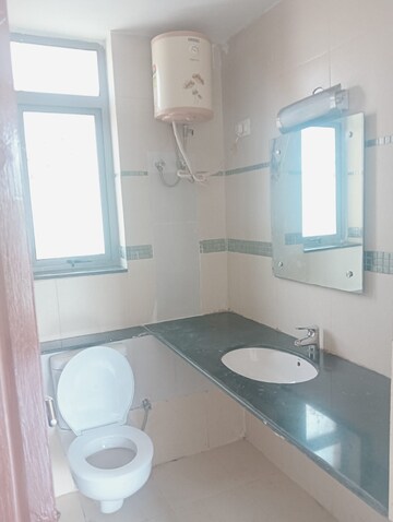 Bathroom in 3 BHK Apartment at Unitech Uniworld Gardens 2, Sector 47 – for Rent