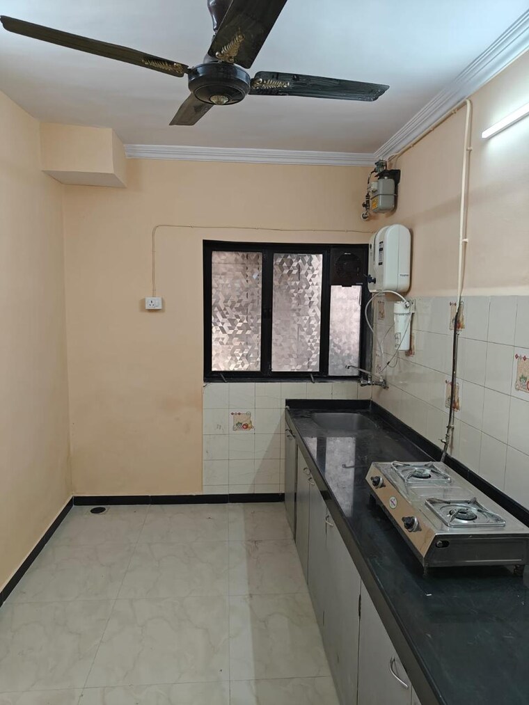 Kitchen, drug-employees-chs 2 Bedroom 750 Sq.Ft. Apartment In Samata Nagar Thane 8769526