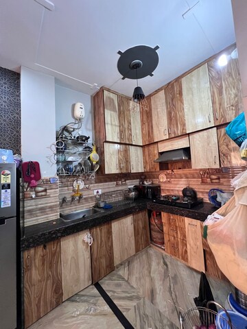 Kitchen in 2 BHK Builder Floor at Palam Vihar Extension – for Rent