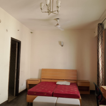 Bedroom in Studio Apartment at Supertech Czar Suites, Omicron I Greater Noida – for Rent