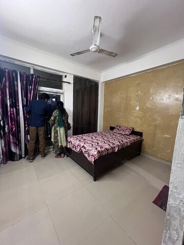 Living Room in 2.5 BHK Apartment at Aims Golf City, Sector 75 – for Rent