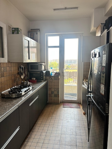 Kitchen in 3 BHK Apartment at Supertech Araville, Sector 79 – for Rent