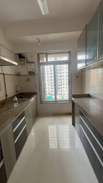 Kitchen in 3 BHK Apartment at Group Seven Rushi Heights, Goregaon East – for Rent