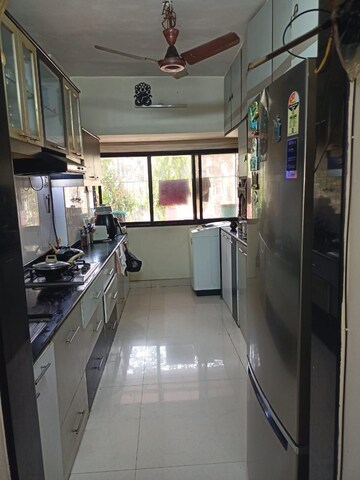 Kitchen in 2 BHK Apartment at Woodland Apartment, Andheri West – for Rent