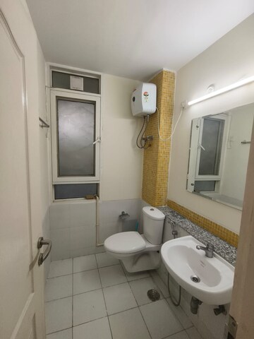 Bathroom in 3 BHK Apartment at Jaypee Greens Pavilion Court, Sector 128 – for Sale