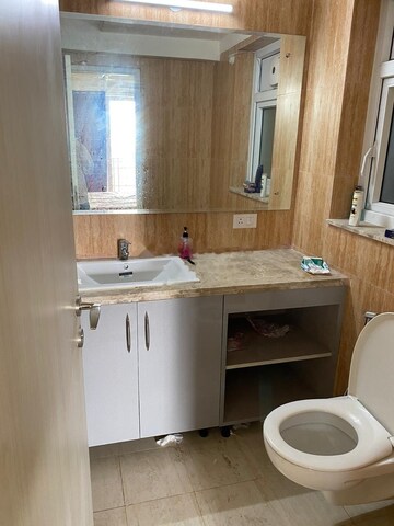 Bathroom in 3 BHK Apartment at DLF The Skycourt, Sector 86 – for Rent