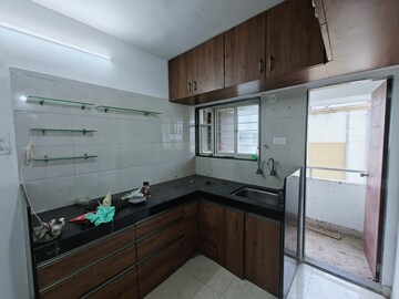 Kitchen in 2 BHK Apartment at Welworth Tinseltown, Bavdhan – for Rent