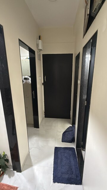 Building Lobby in 1 BHK Apartment at Morya Blue Moon, Andheri West – for Rent
