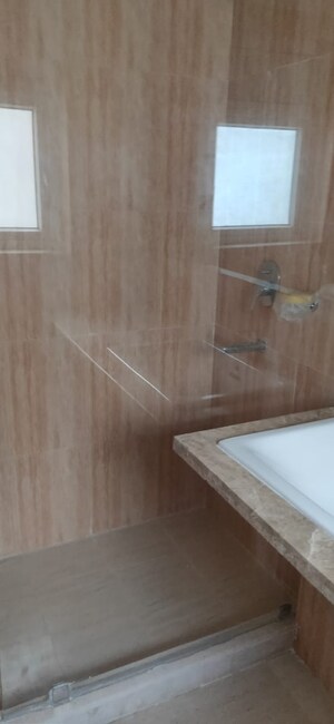 Bathroom in 3 BHK Apartment at DLF The Skycourt, Sector 86 – for Sale