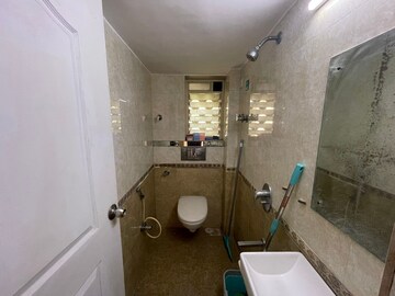 Bathroom in 3 BHK Apartment at Troika Apartment, Andheri West – for Rent