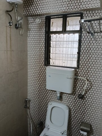 Bathroom in 3 BHK Apartment at Troika Apartment, Andheri West – for Rent