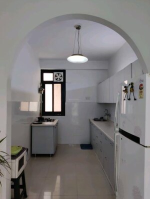 Kitchen in 3 BHK Apartment at Gaur Green City, Indrapuram – for Sale