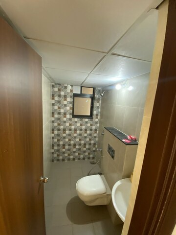 Bathroom in 2 BHK Apartment at Shapoorji Pallonji Vanaha Golfland, Bavdhan – for Rent