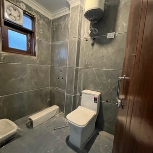 Bathroom in 2 BHK Builder Floor at Chattarpur – for Sale