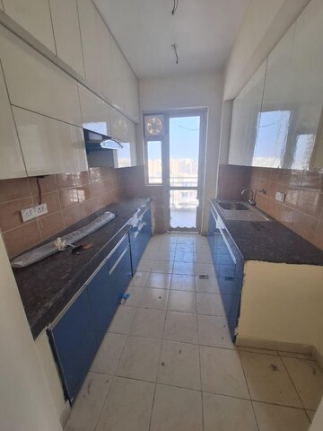 Kitchen in 3 BHK Apartment at ILD Grand, Sector 37c – for Rent