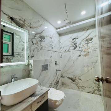 Bathroom in 4 BHK Builder Floor at Ansal API Esencia, Sector 67 – for Sale