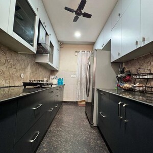 Kitchen in 4 BHK Builder Floor at Unitech South City II, South City 2 – for Sale