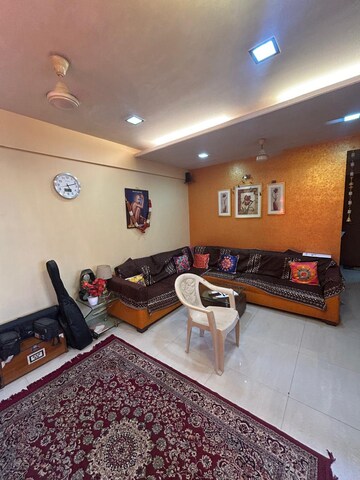 Living Room in 2 BHK Apartment at Riddhi Tower, Malad East – for Rent