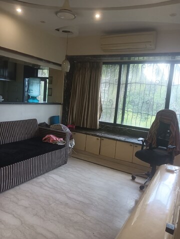 Living Room in 1 BHK Apartment at Bandra West – for Rent