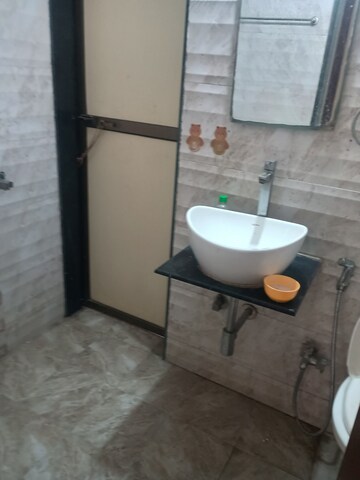 Bathroom in 1 BHK Apartment at VR Bhoomi Acre I Wing, Waghbil – for Rent