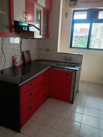 Kitchen in 1 BHK Apartment at Hiranandani Estate Oyster, Ghodbunder Road – for Sale
