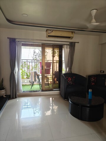 Living Room in 2 BHK Apartment at Vijay Galaxy, Waghbil – for Rent