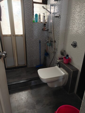Bathroom in 2 BHK Apartment at Vijay Galaxy, Waghbil – for Rent
