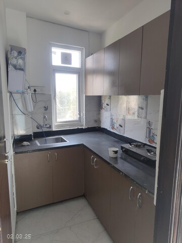 Kitchen in 1 BHK Apartment at Ansal Sushant Floors, Sushant Lok ii – for Rent