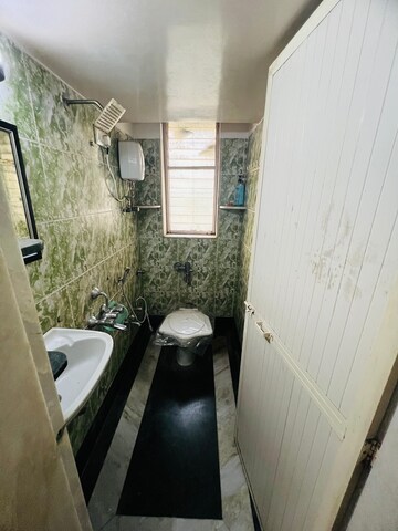 Bathroom in 1 BHK Apartment at Khar West – for Rent