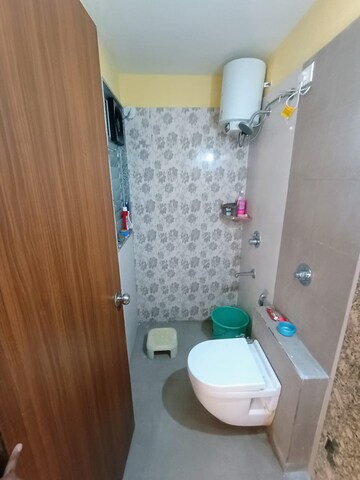 Bathroom in 2 BHK Apartment at Axis Paradigm Whistling Meadows, Paud Road – for Sale