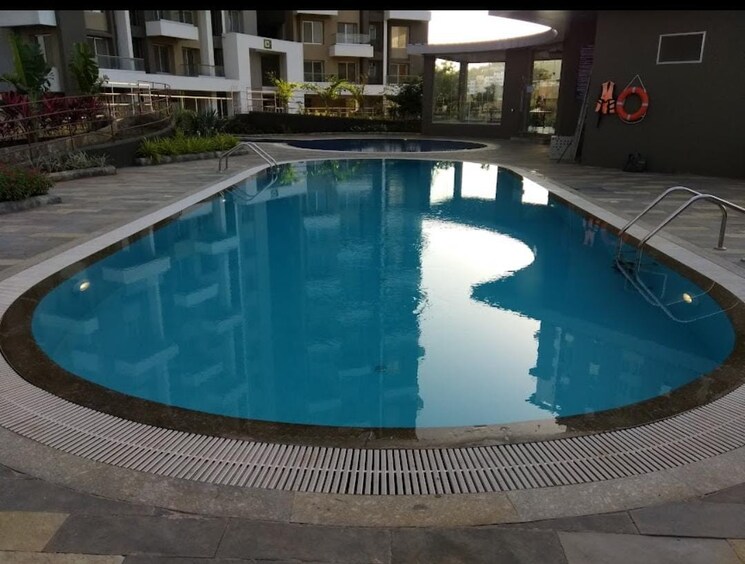 Swimming Pool, axis-paradigm-whistling-meadows 2 Bedroom 750 Sq.Ft. Apartment In Paud Road Pune 8771557