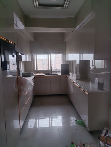 Kitchen in 2 BHK Apartment at Pink and Blue Dhruv Apartment, Sector 46 – for Sale