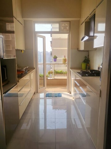 Kitchen in 2 BHK Apartment at Omkar Alta Monte, Malad East – for Rent