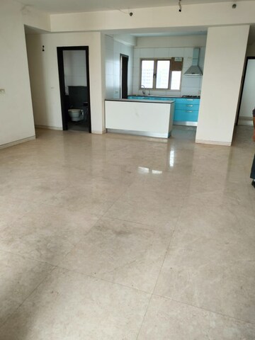Living Room in 4 BHK Apartment at Tata Raheja Raisina Residency, Sector 59 – for Sale