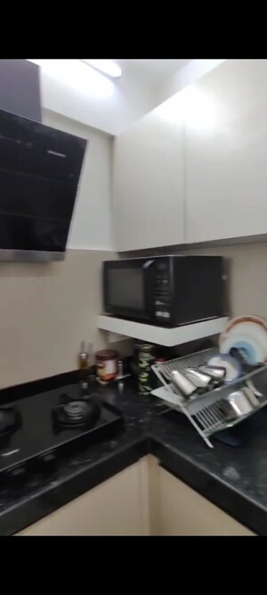 Kitchen in 1 BHK Apartment at JP North Elara, Mira Road – for Sale