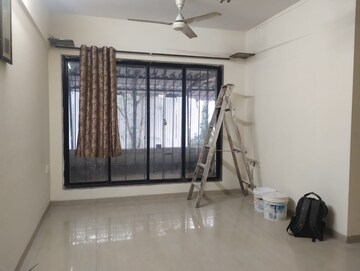Living Room in 2 BHK Apartment at Suncity Jupiter, Powai – for Rent